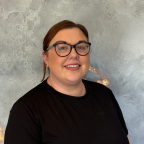 A couple looking at our Meet the team page