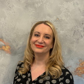 A couple looking at our Meet the team page